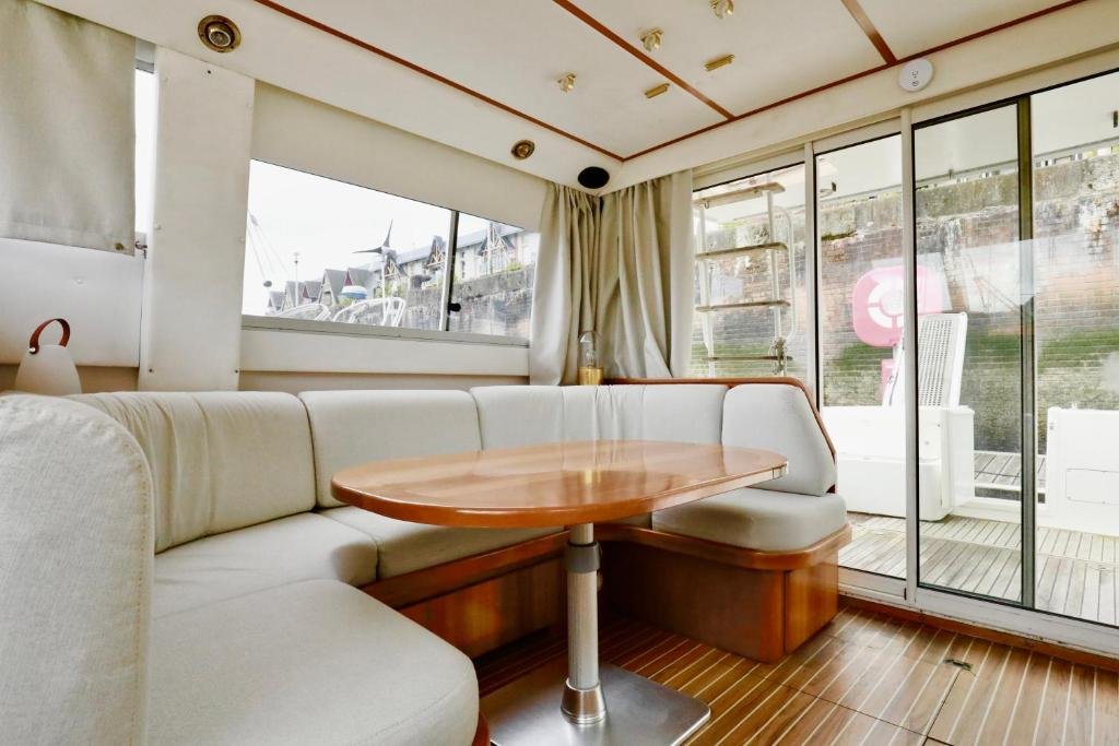 Saloon and dining area aboard YACHT DEAUVILLE